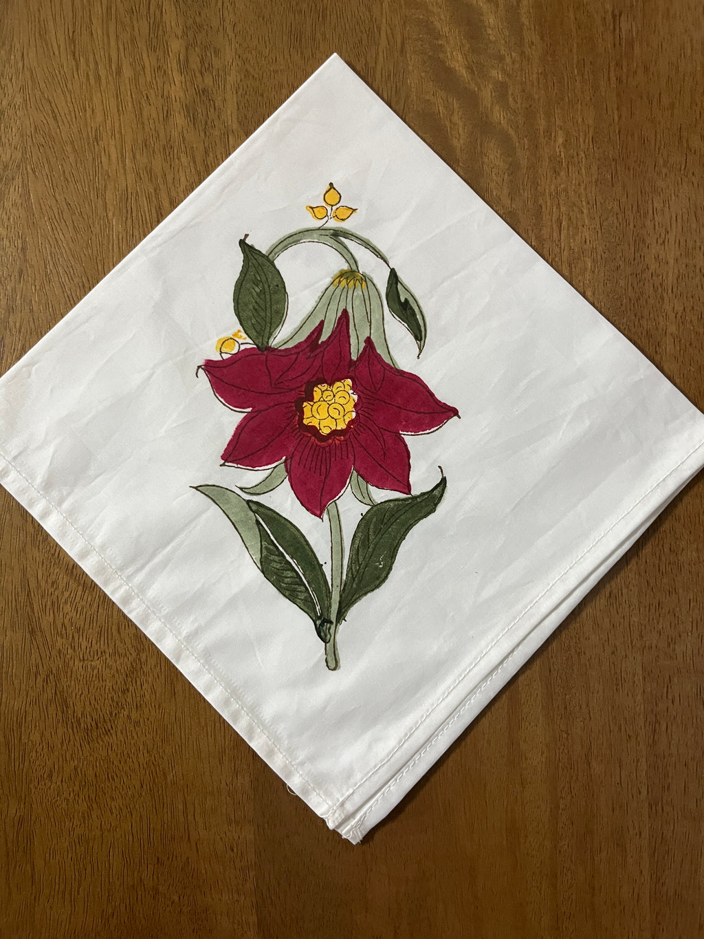 A Pair of Tropical Bloom Table Mat and Napkin Set