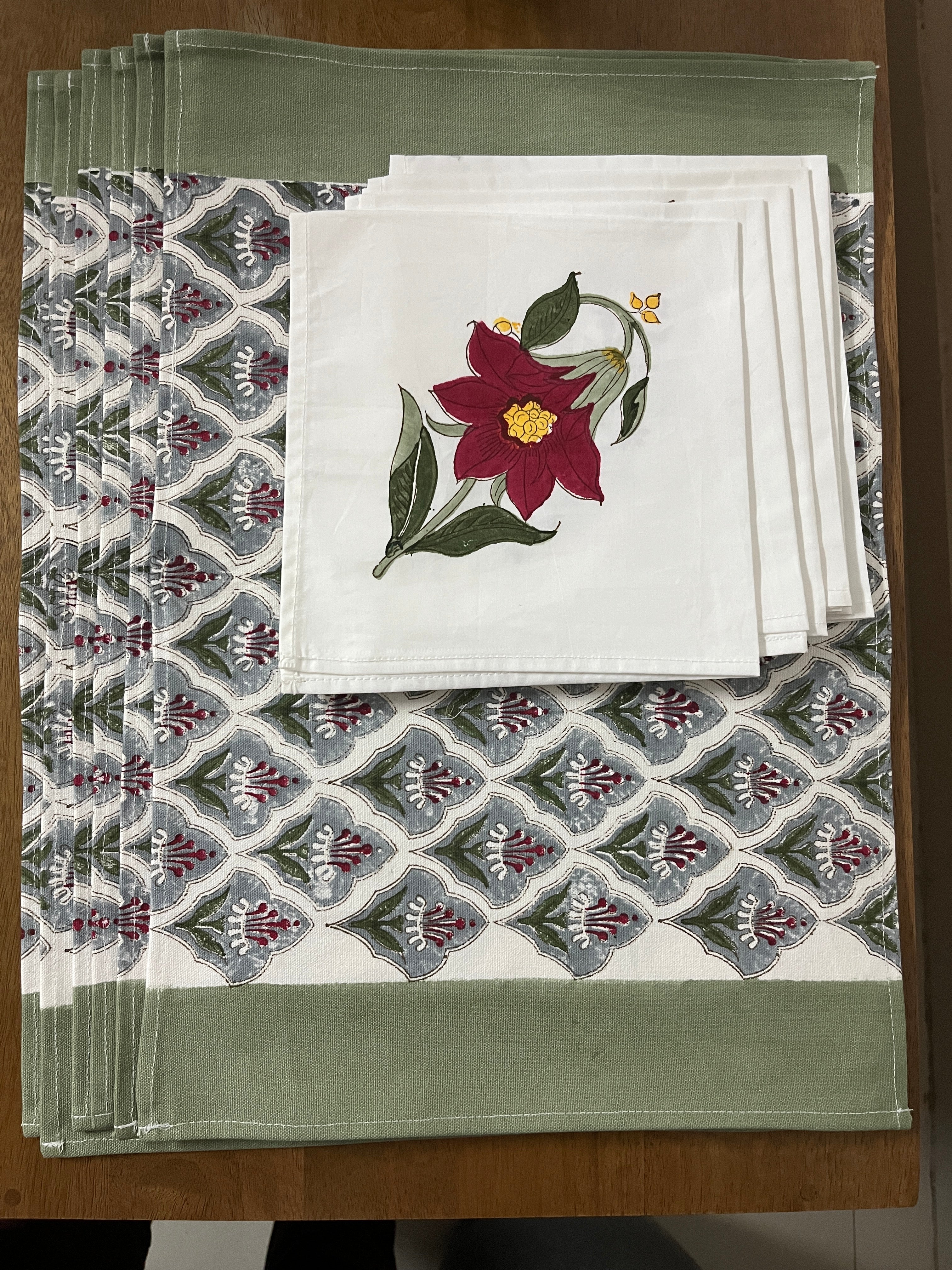A Pair of Tropical Bloom Table Mat and Napkin Set